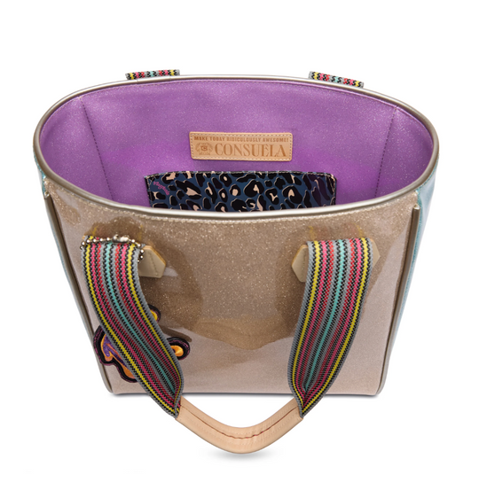 Consuela Emery Classic Tote bag with glittery beige exterior, colorful striped handles, and purple interior lining