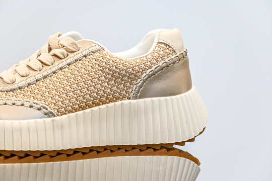 ShuShop beige and gold sneaker fashion with textured upper and thick white sole for stylish comfort