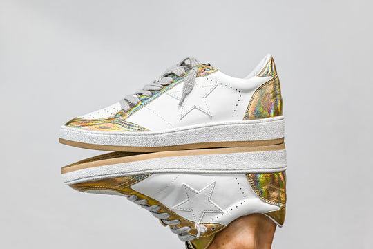 ShuShop Paz gold sneaker women with white leather and gold iridescent accents on sole and heel