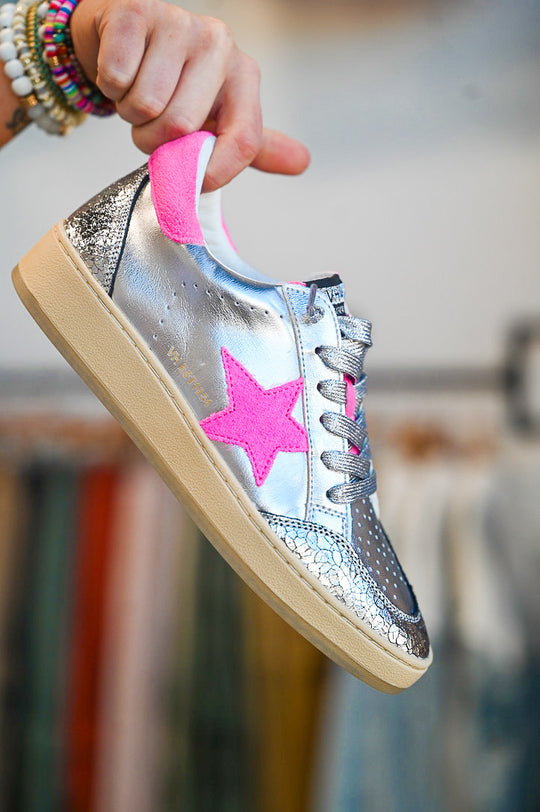 Vintage Havana sneaker fashion silver sneakers with pink star and accents held by hand with bracelets