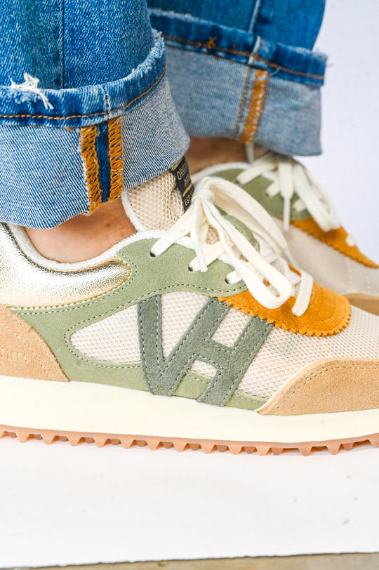 Vintage Havana sneakers in beige green and orange mesh and suede worn with cuffed blue jeans