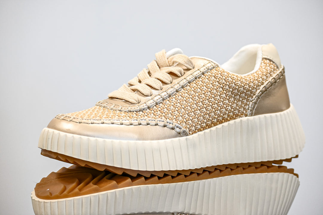 ShuShop gold sneaker fashion with woven upper and thick white sole for stylish comfort