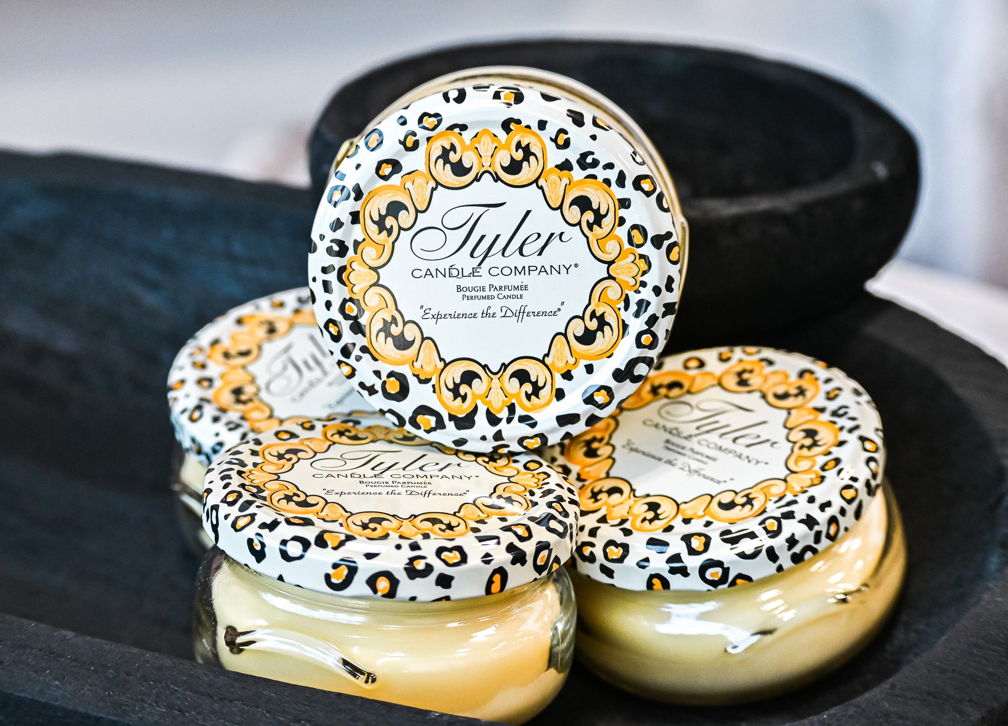 Tyler Candle Company pineapple scented candle in decorative leopard print tin with yellow wax
